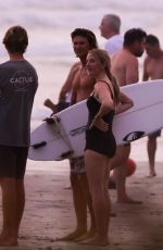 ELLIE GOULDING and Armando Perez at a Beach in Costa Rica 03/29/2024