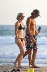 ELLIE GOULDING and Armando Perez at a Beach in Costa Rica 03/29/2024