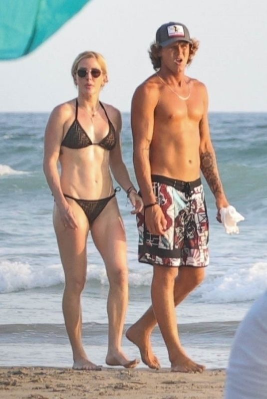 ELLIE GOULDING and Armando Perez at a Beach in Costa Rica 03/29/2024