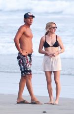 ELLIE GOULDING and Armando Perez on Vacation in Costa Rica 03/27/2024