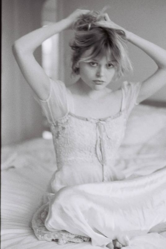 EMILY ALYN LIND at a Photoshoot, April 2024