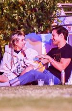 EMMA ROBERTS with Mystery Guy at Coachella 04/13/2024