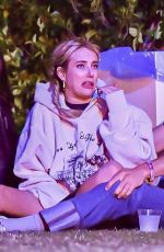 EMMA ROBERTS with Mystery Guy at Coachella 04/13/2024