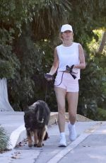 GISELE BUNDCHEN Out for a Morning Walk with Her Dog in Miami Beach 04/24/2024