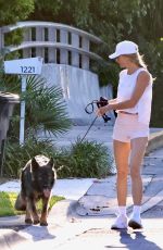 GISELE BUNDCHEN Out for a Morning Walk with Her Dog in Miami Beach 04/24/2024
