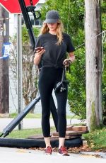 GISELE BUNDCHEN Out with Her Dog in Miami Beach 04/16/2024