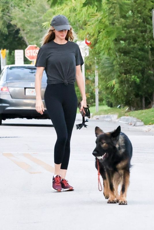 GISELE BUNDCHEN Out with Her Dog in Miami Beach 04/16/2024
