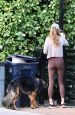 GISELE BUNDCHEN Out with Her German Shepherd in Miami 04/24/2024