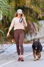 GISELE BUNDCHEN Out with Her German Shepherd in Miami 04/24/2024