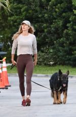 GISELE BUNDCHEN Out with Her German Shepherd in Miami 04/24/2024