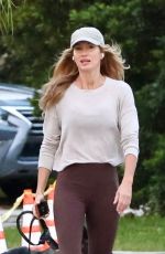 GISELE BUNDCHEN Out with Her German Shepherd in Miami 04/24/2024