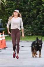GISELE BUNDCHEN Out with Her German Shepherd in Miami 04/24/2024