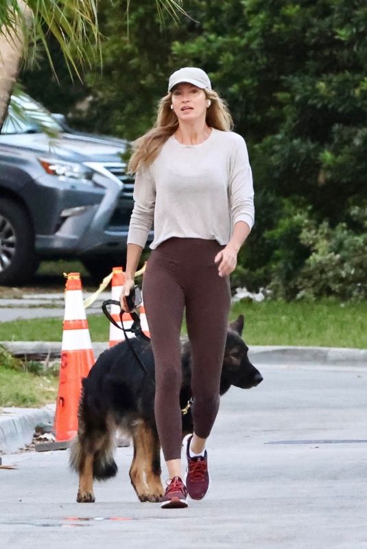 GISELE BUNDCHEN Out with Her German Shepherd in Miami 04/24/2024