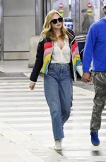 HEATHER GRAHAM and John De Neufville Arrives at Miami International Airport 03/08/2024
