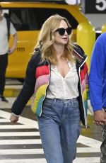 HEATHER GRAHAM and John De Neufville Arrives at Miami International Airport 03/08/2024