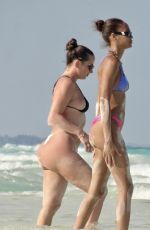 JOAN SMALLS in Bikini at a Beach in Tulum 04/23/2024
