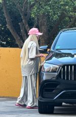 KAROL G Out in a Silver Jumpsuit in Miami 04/20/2024