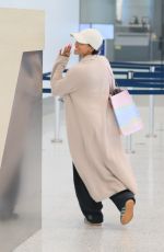 KARRUECHE TRAN Arrives at LAX Airport in Los Angeles 04/27/2024