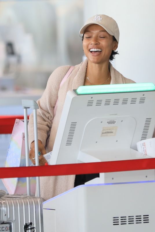 KARRUECHE TRAN Arrives at LAX Airport in Los Angeles 04/27/2024