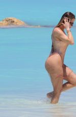 KHLOE KARDASHIAN in Swimsuit at a Beach in Turks and Caicos 04/03/2024