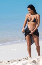 KIM KARDASHIAN in Bikini at a Beach in Turks and Caicos 04/04/2024