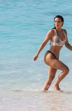 KIM KARDASHIAN in Bikini at a Beach in Turks and Caicos 04/04/2024