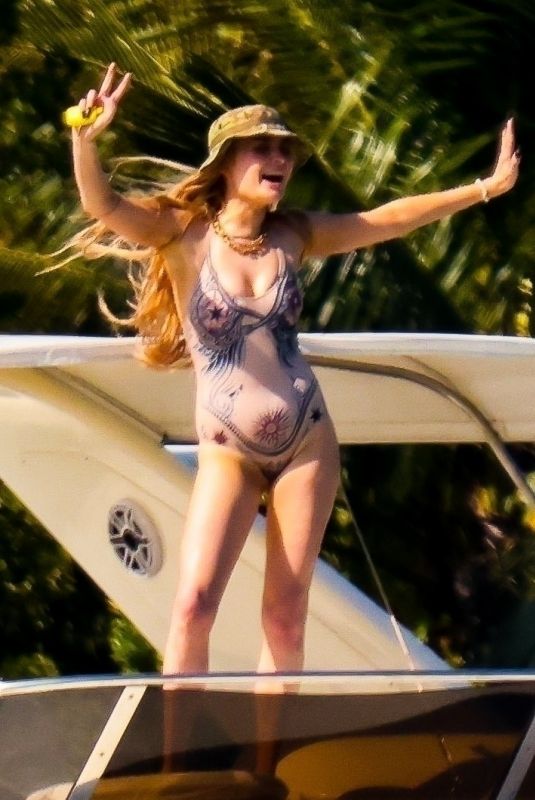 KIM PETRAS in Swimsuit on Vacation in Miami Bay 04/10/2024
