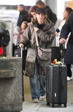 KYLIE MINOGUE Arrives at JFK Airport in New York 04/25/2024