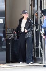LILY JAMES Checks Out of Her Hotel in London 04/06/2024