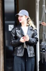 LILY JAMES Checks Out of Her Hotel in London 04/06/2024
