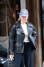 LILY JAMES Checks Out of Her Hotel in London 04/06/2024