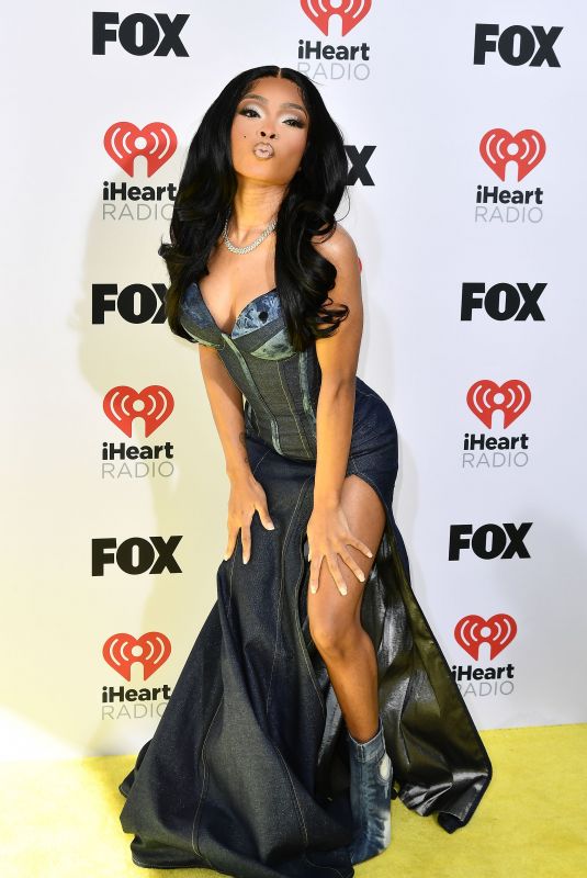 LOLA BROOKE at 2024 iHeartRadio Music Awards in Hollywood 04/01/2024