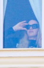 MADONNA Admires Copacabana Beach from Her Hotel Window 04/29/2024