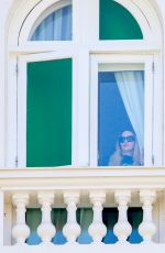 MADONNA Admires Copacabana Beach from Her Hotel Window 04/29/2024