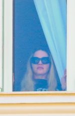 MADONNA Admires Copacabana Beach from Her Hotel Window 04/29/2024
