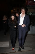 MARISA ABELA and Jamie Bogyo with Eddie Marsan and Friends Arrives at Caviar Kaspia in Paris 04/23/2024