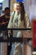 MICHELLE KEEGAN Checking in for a Flight at Sydney