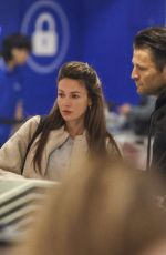 MICHELLE KEEGAN Checking in for a Flight at Sydney