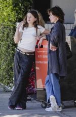 MILLA JOVOVICH and Her Daughter EVER ANDERSON Leaves Chateau Marmont in Los Angeles 04/17/2024