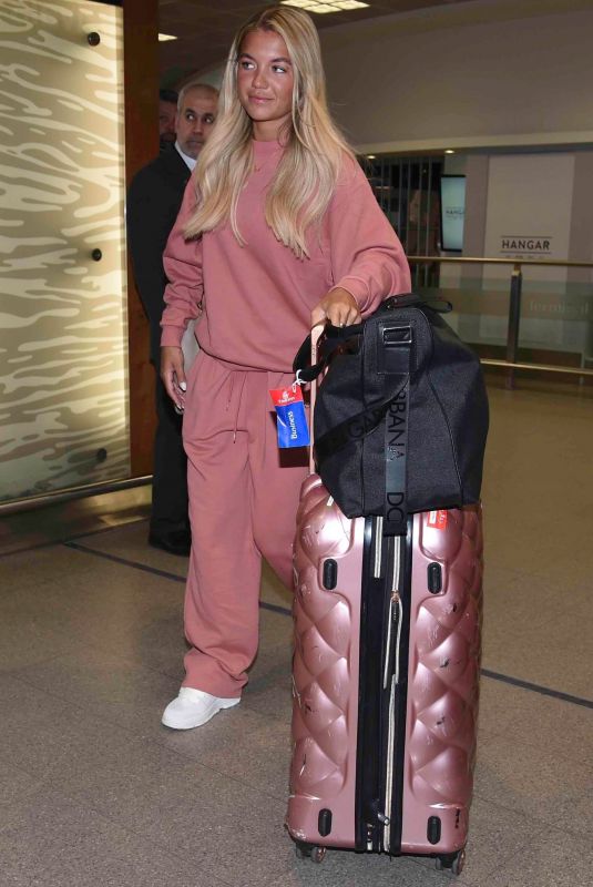 MOLLY SMITH Lands Back at Manchester Airport 04/16/2024
