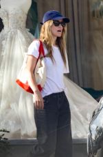 OLIVIA WILDE Shopping at a Toy Store in Studio City 04/07/2024
