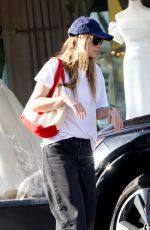OLIVIA WILDE Shopping at a Toy Store in Studio City 04/07/2024