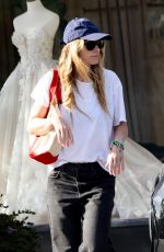 OLIVIA WILDE Shopping at a Toy Store in Studio City 04/07/2024