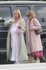 Pregnant HILARY DUFF Arrives Home with Her Mom 04/24/2024