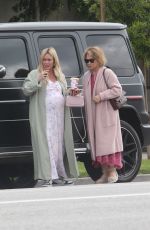 Pregnant HILARY DUFF Arrives Home with Her Mom 04/24/2024