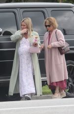 Pregnant HILARY DUFF Arrives Home with Her Mom 04/24/2024
