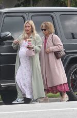 Pregnant HILARY DUFF Arrives Home with Her Mom 04/24/2024