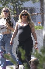 Pregnant HILARY DUFF Out Hikinig with Friends in Los Angeles 04/22/2024