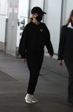 REESE WITHERSPOON Arrives at LAX Airport in Los Angeles 04/29/2024
