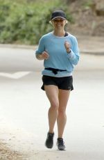 REESE WITHERSPOON Out Jogging Near Her Home in Brentwood 04/23/2024